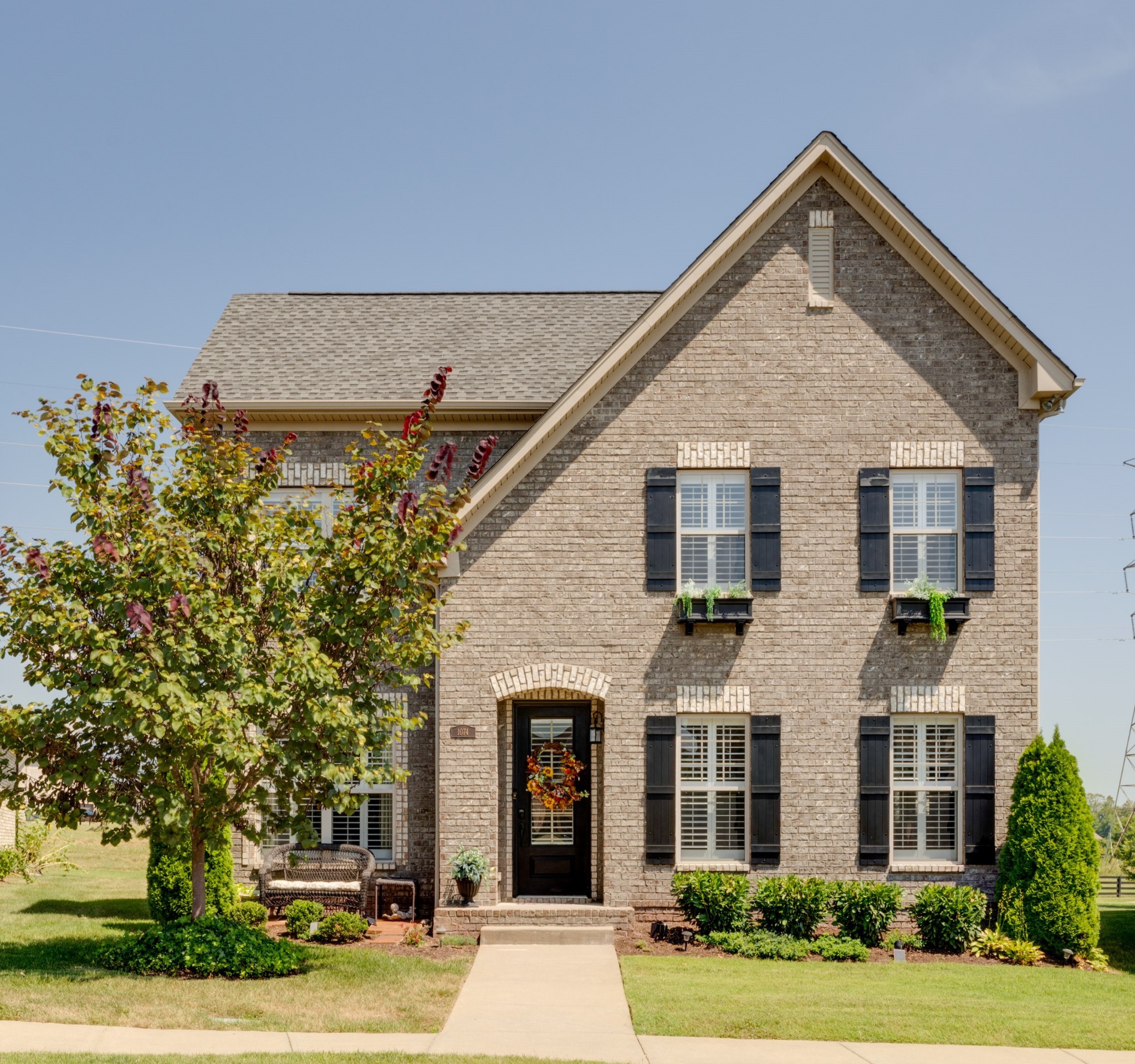 Welcome to 1074 Paddock Park Circle! This home is one of the many charming, full-brick homes on Paddock Park Cirlce, but THIS one has a much larger lot than most!