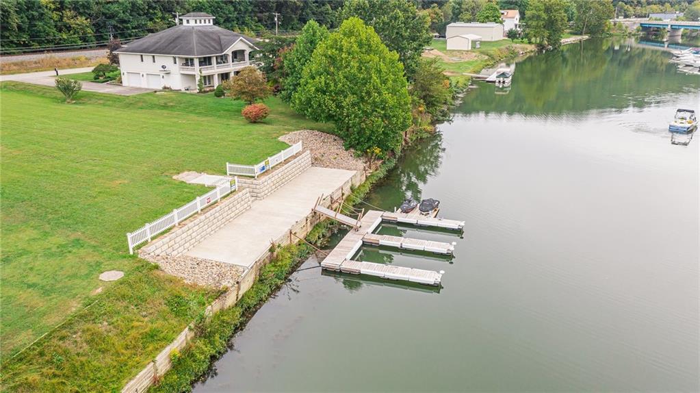 a view of a lake with a yard