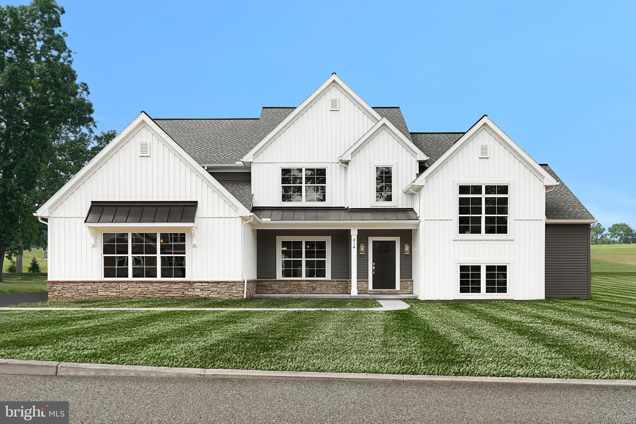 a view of a yard in front of a house with a yard