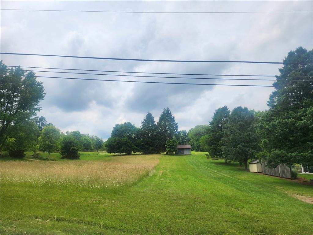 a view of open space with garden view