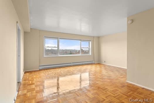 a view of an empty room and window