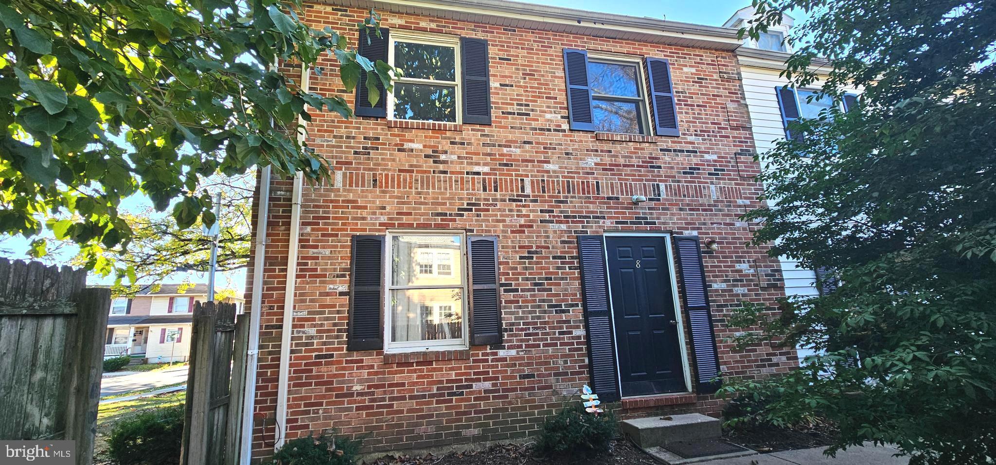 a brick building with a large windows