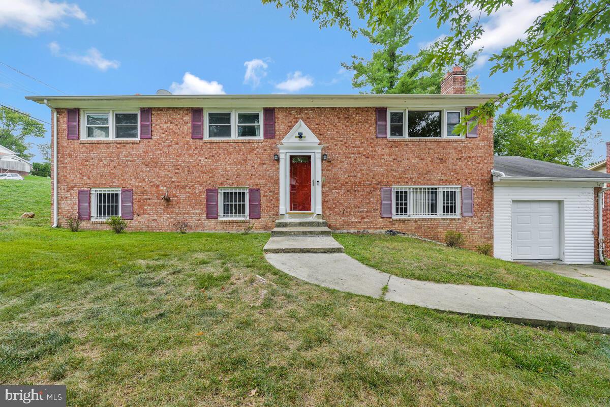 a brick house with a large windows