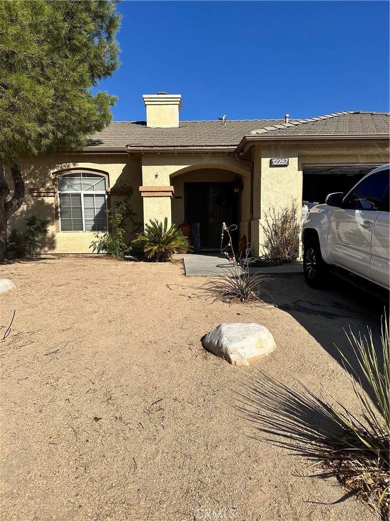 a view of a house with a patio