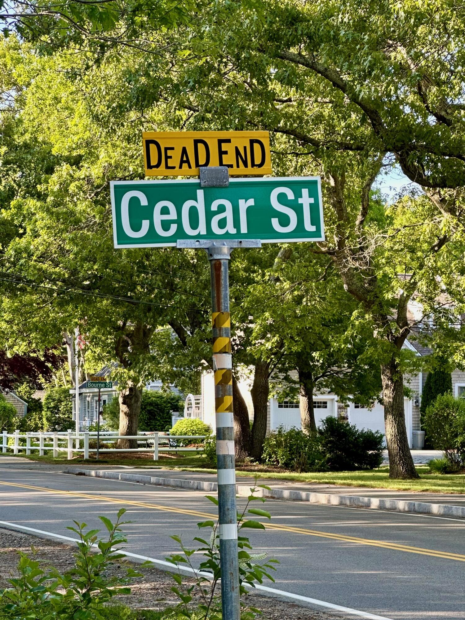 a street sign on a pole on a street