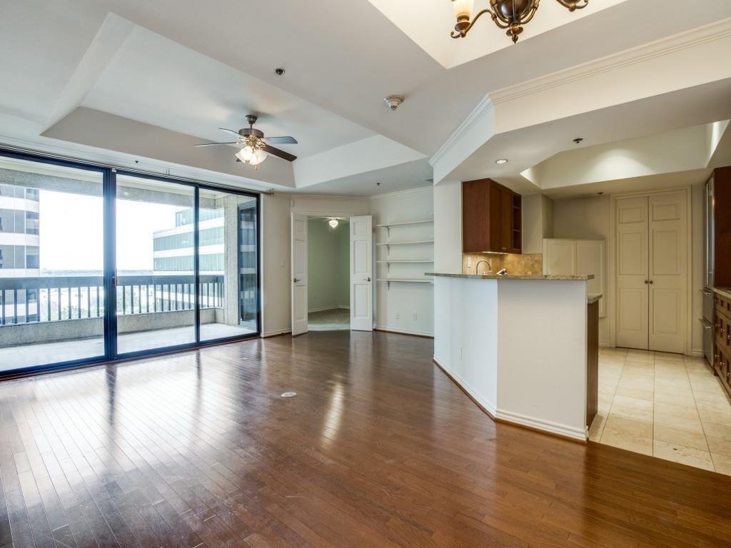 a view of a kitchen with a sink and a window