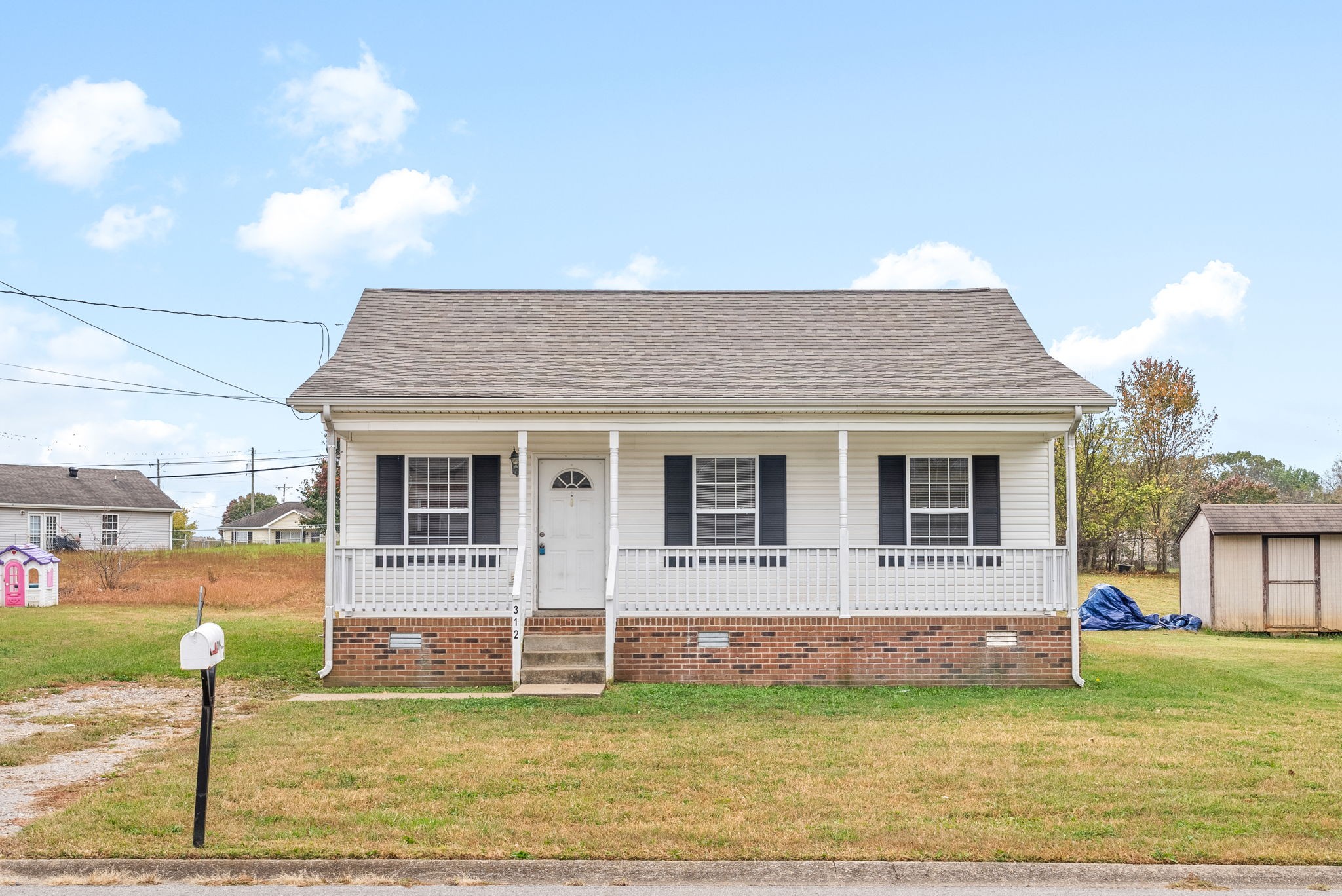 a view of a house with garden