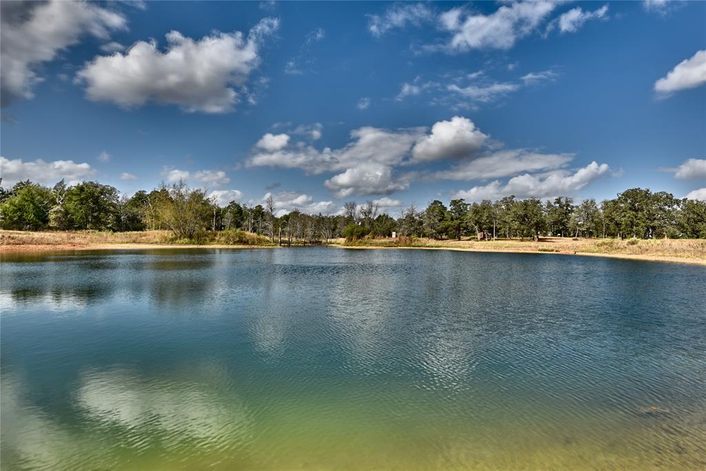 a view of a lake in middle of the town