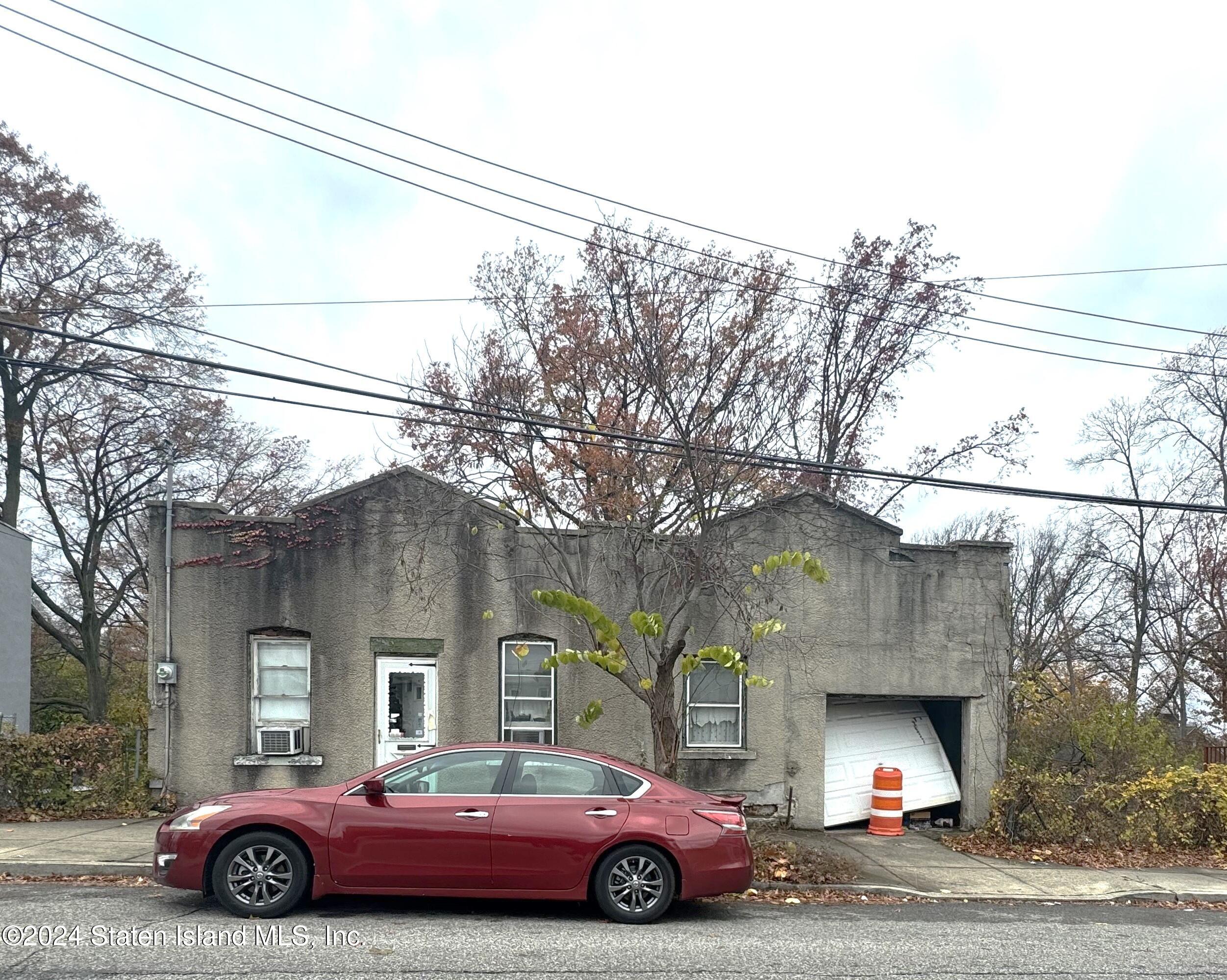 a car parked in front of a building