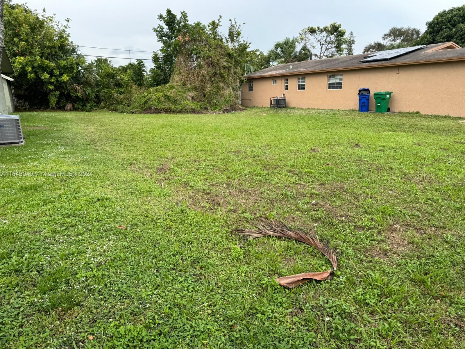 a view of outdoor space and yard