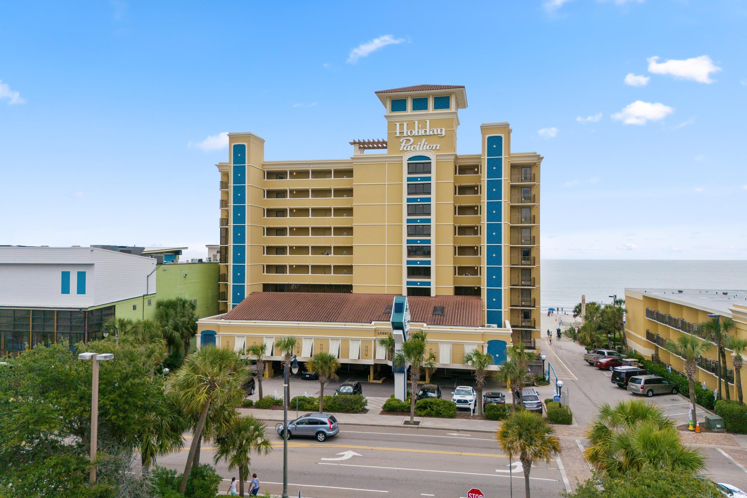 View of building exterior featuring a water view