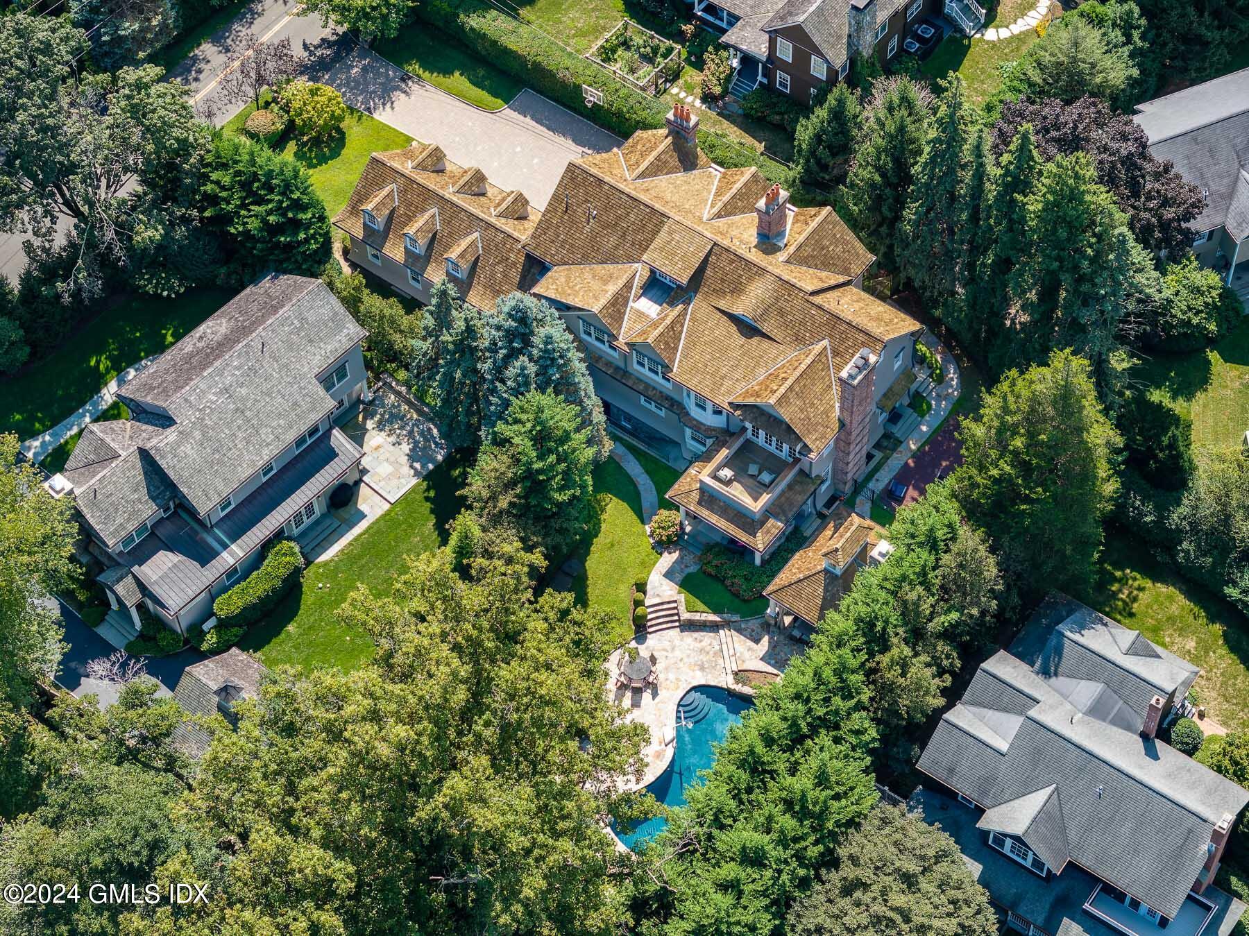 an aerial view of a house with a garden