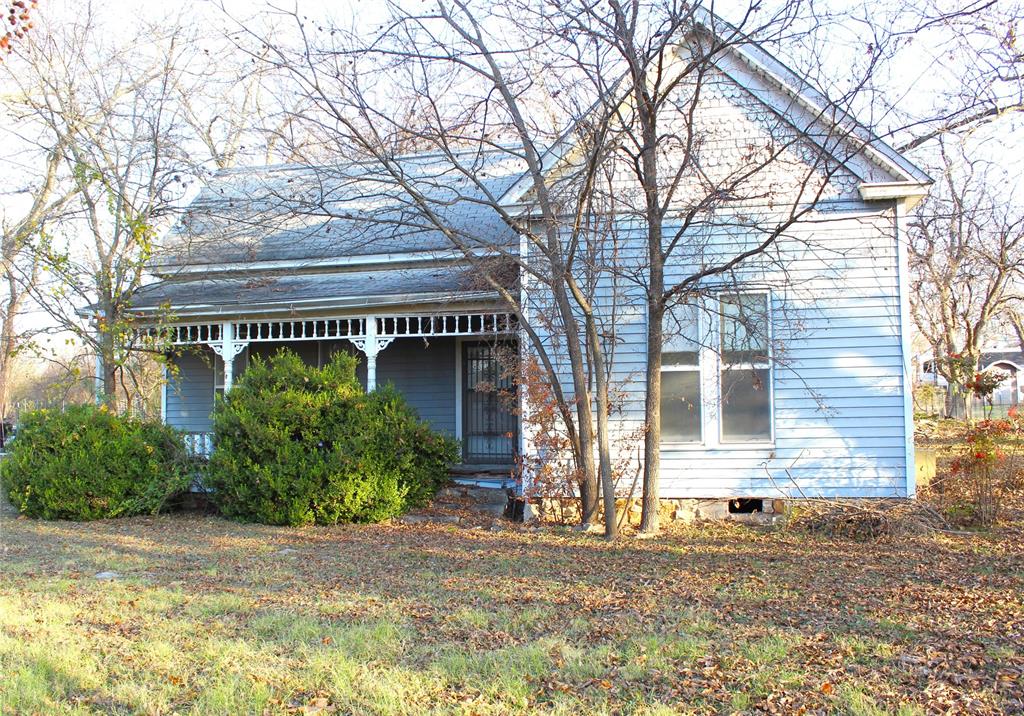 front view of a house with a street