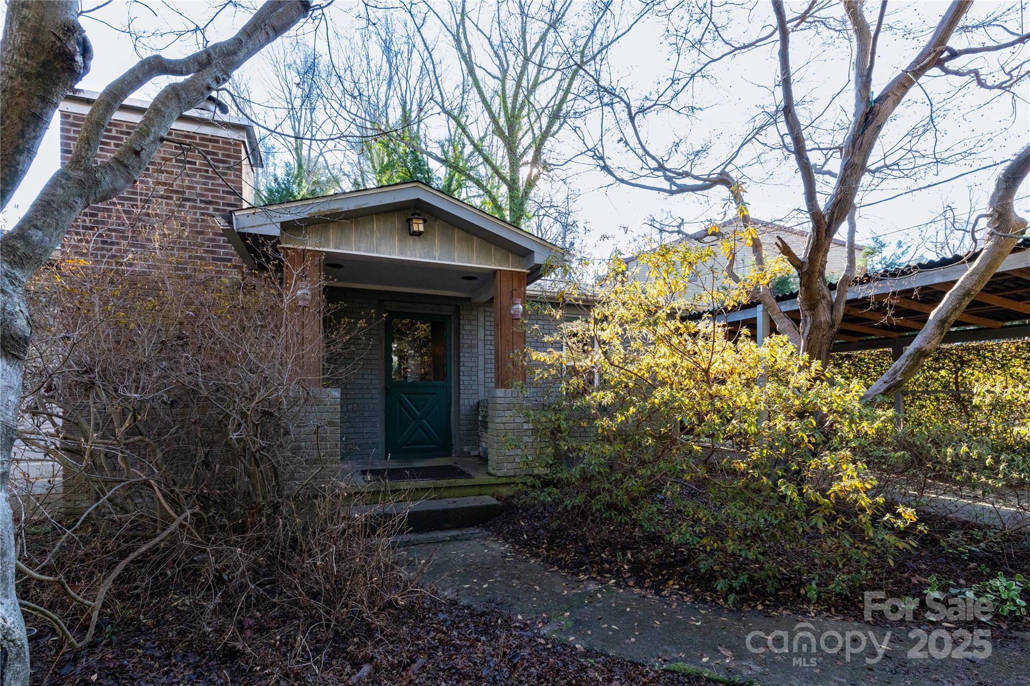 a house with trees in front of it