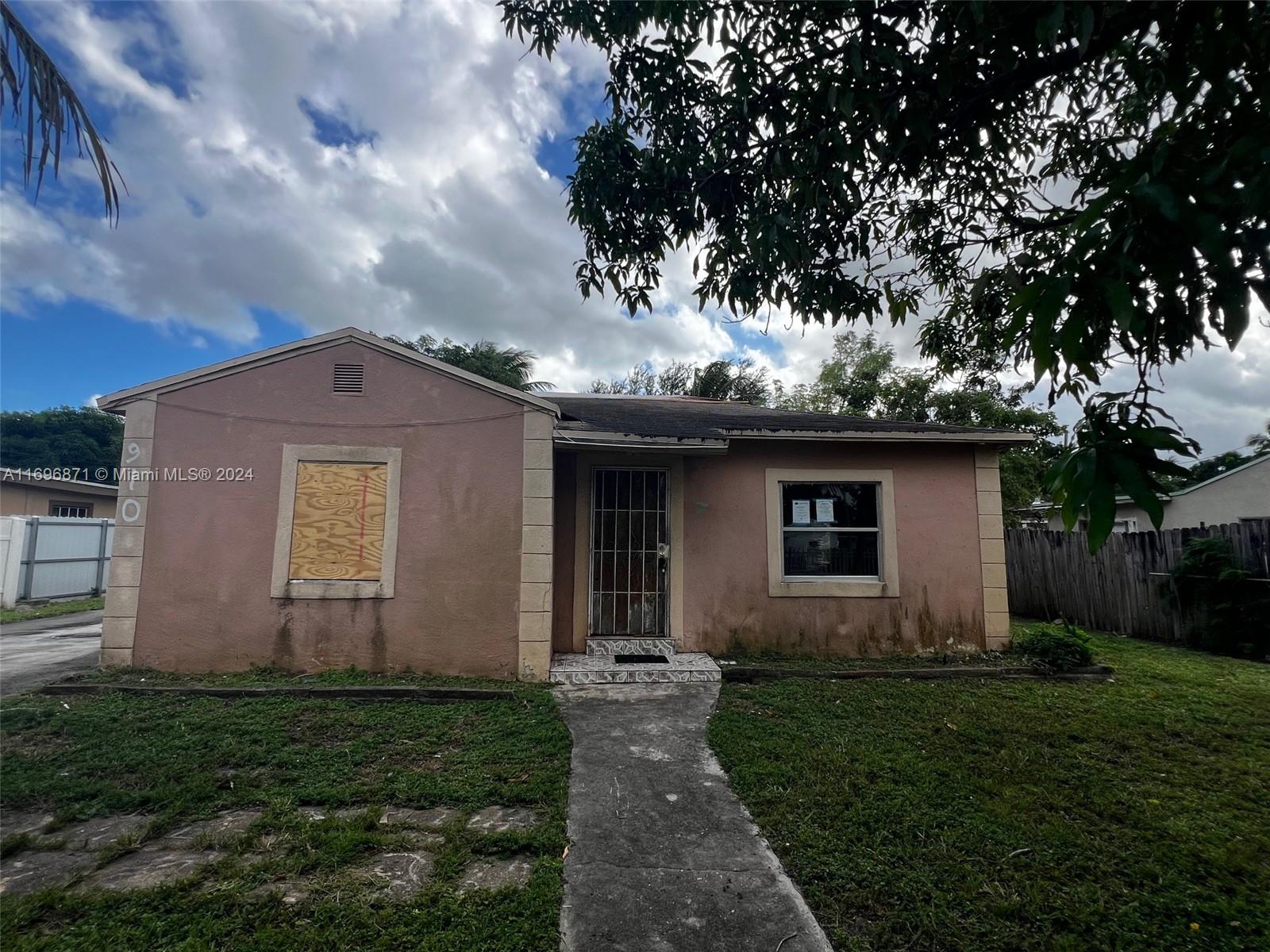 a front view of house with yard