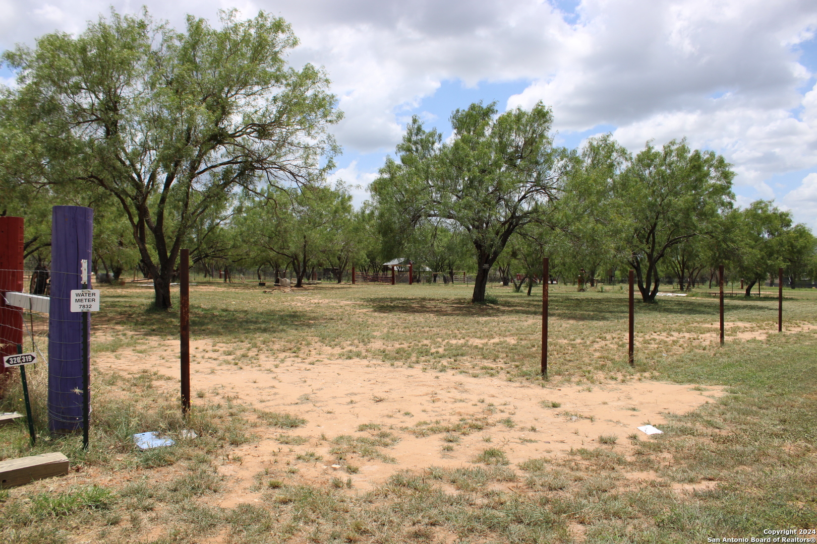 a view of a park with swings