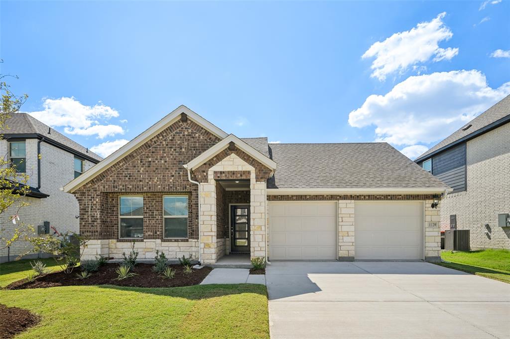 a front view of a house with patio