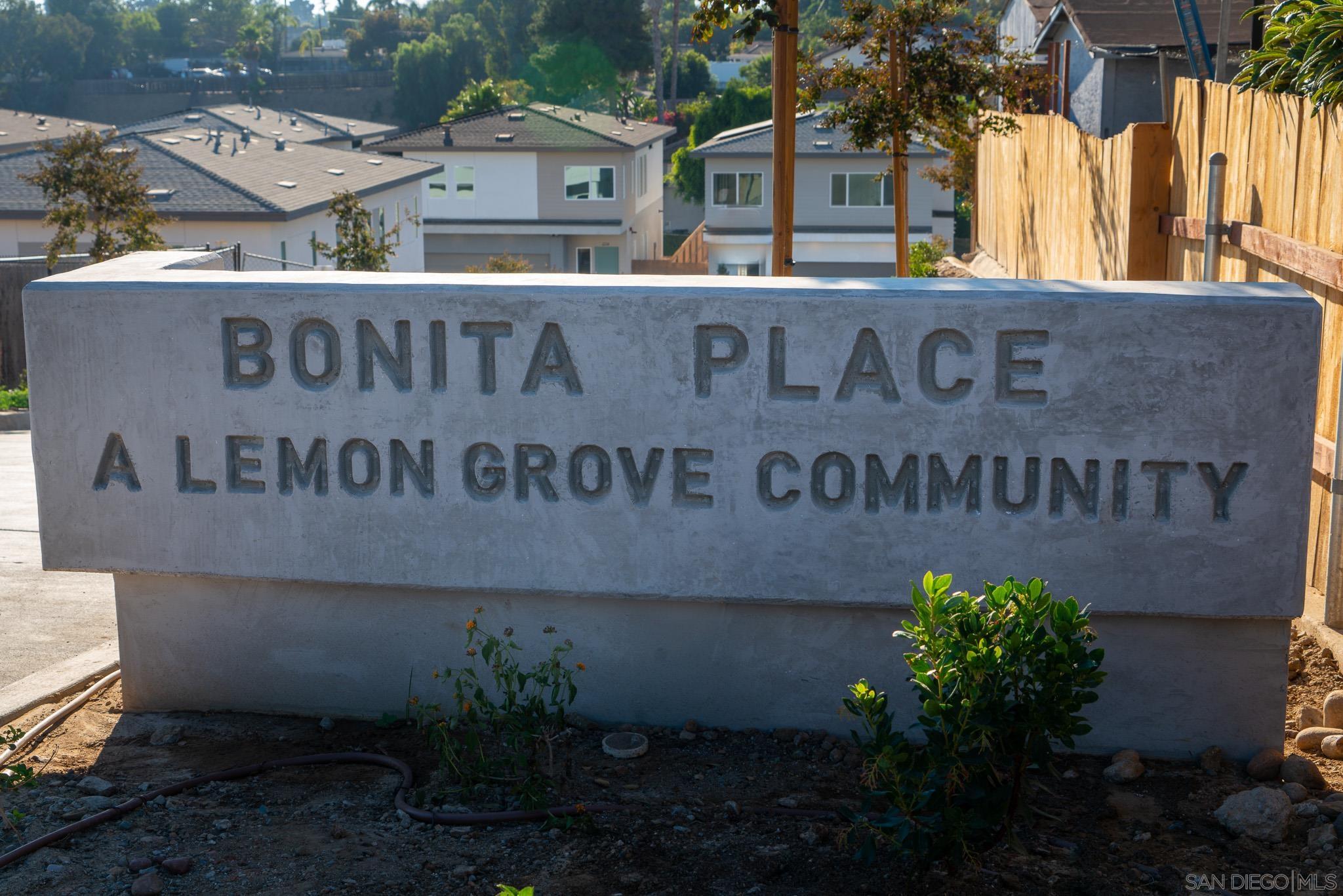 a sign broad on the side of the road