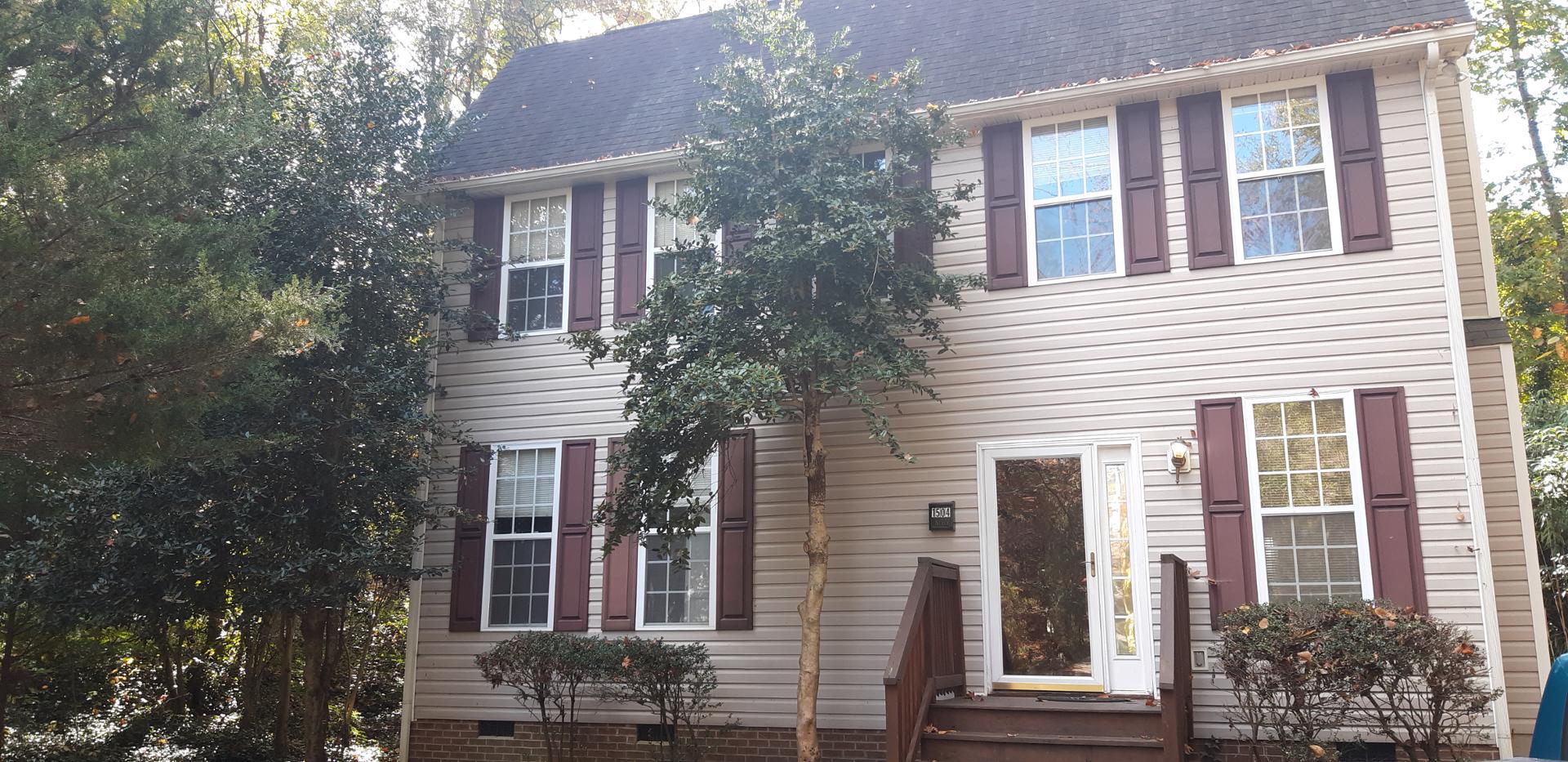 front view of house with a tree