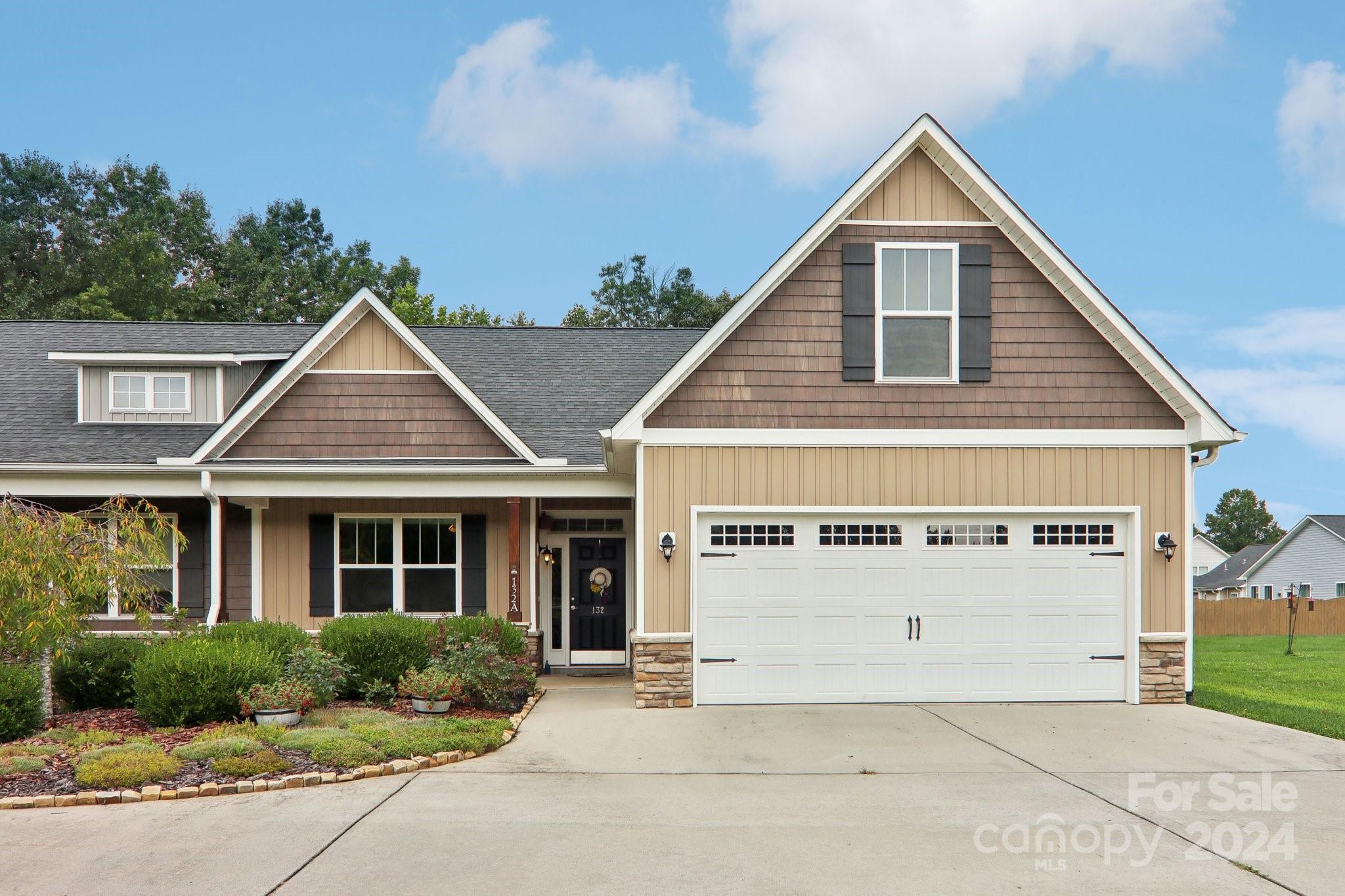 a view of a house with garage