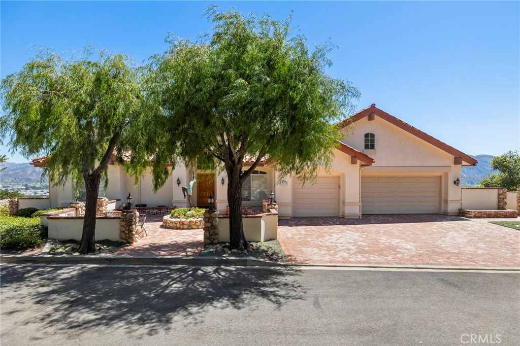 Front of house, trees were trimmed