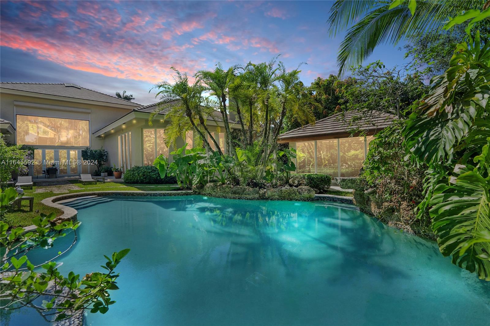 a view of a house with a swimming pool