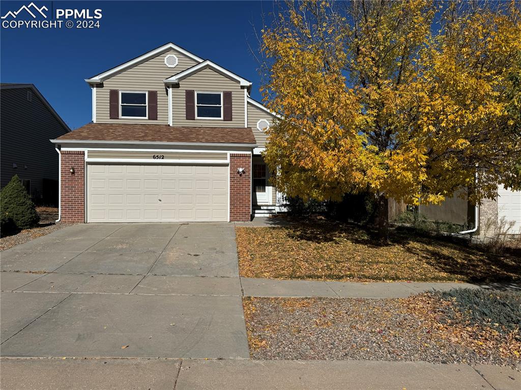 Front facade featuring a garage