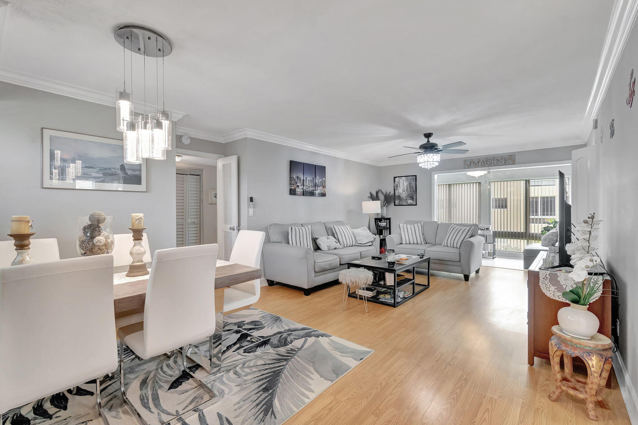 a living room with furniture or window and a dining table