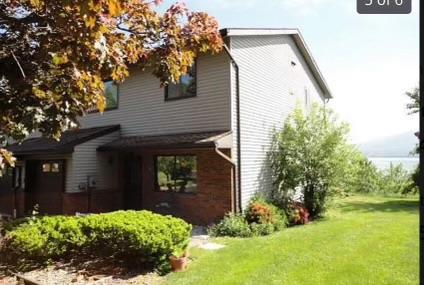 View of home's exterior featuring a lawn