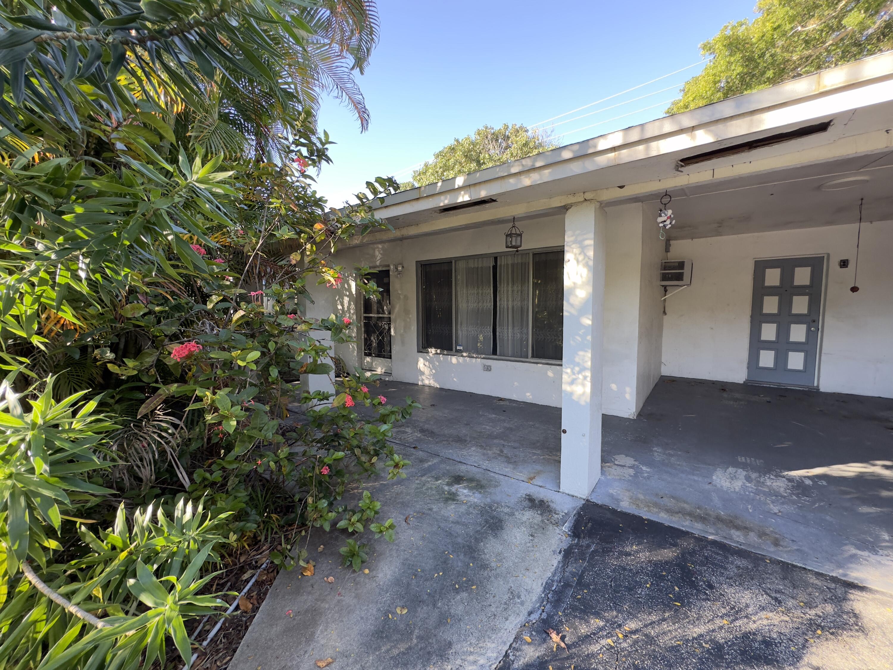 a front view of a house with a porch