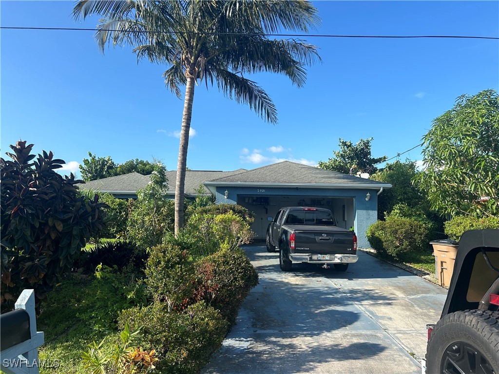 a car parked in front of a house