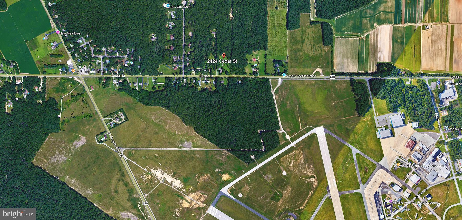 an aerial view of a golf course with swimming pool