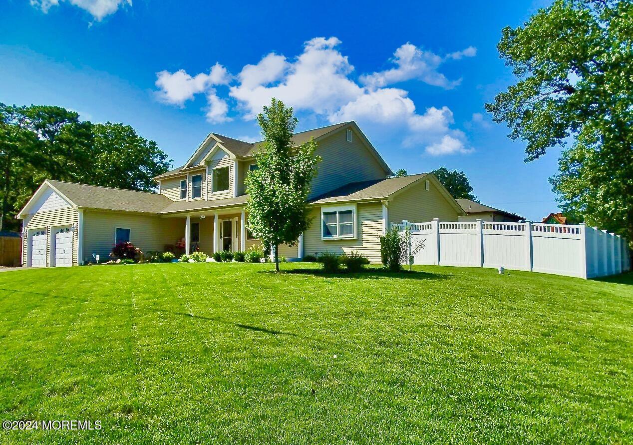 a view of a house with a garden