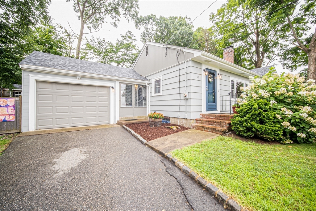 a front view of house with yard