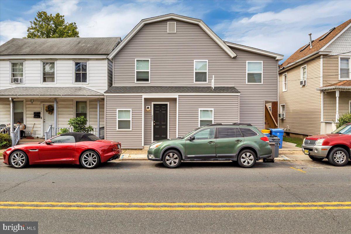 a car parked in front of a house