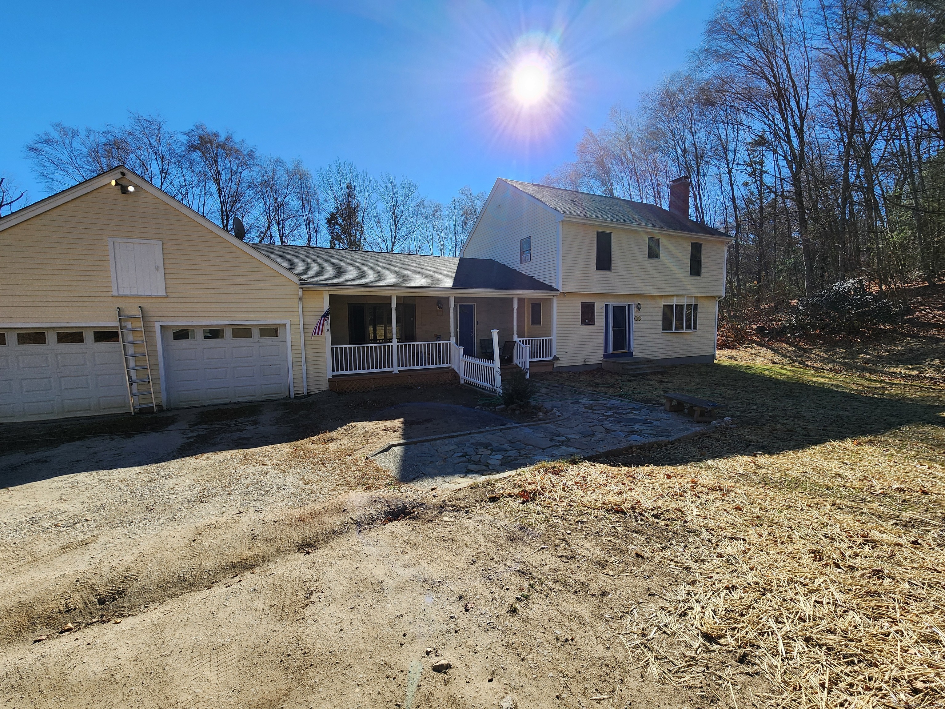 a view of a house with a yard