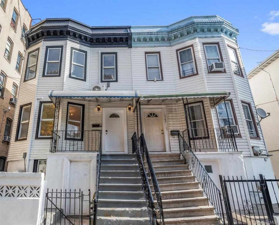 a front view of a house with a balcony