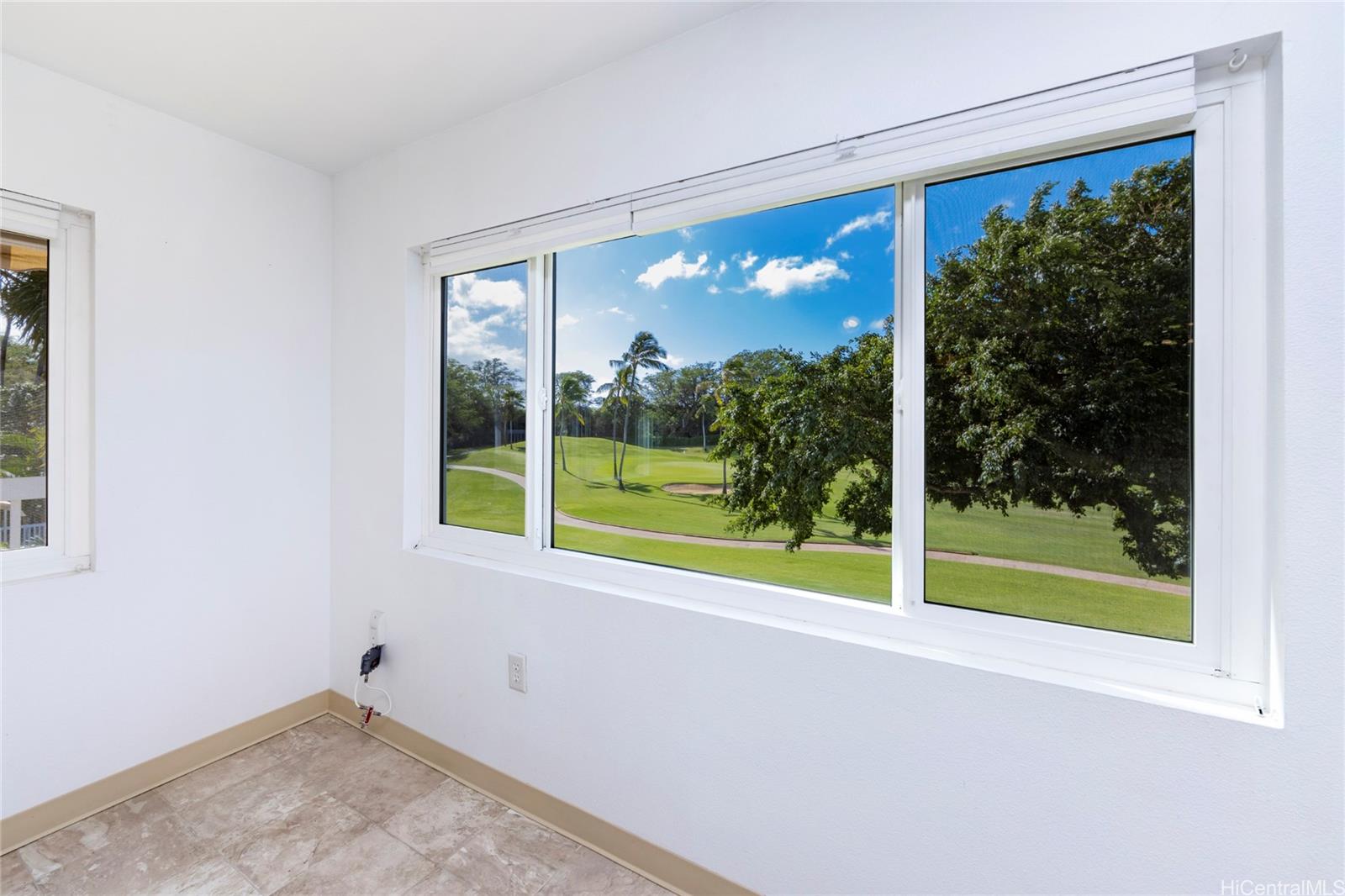 a view of a room with a large window