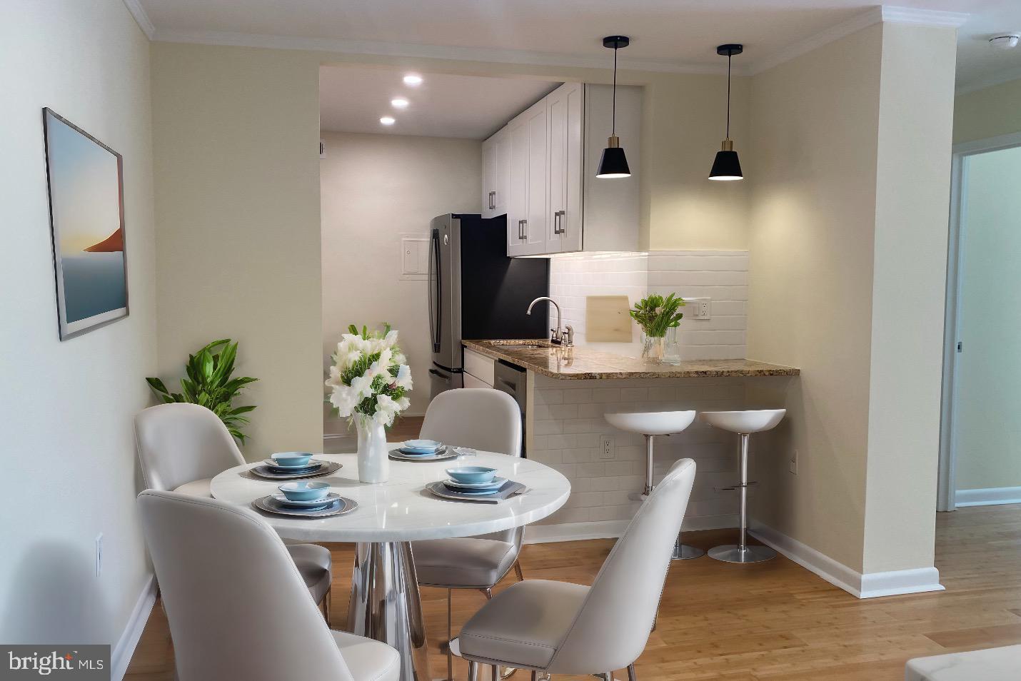 a view of a dining room with furniture