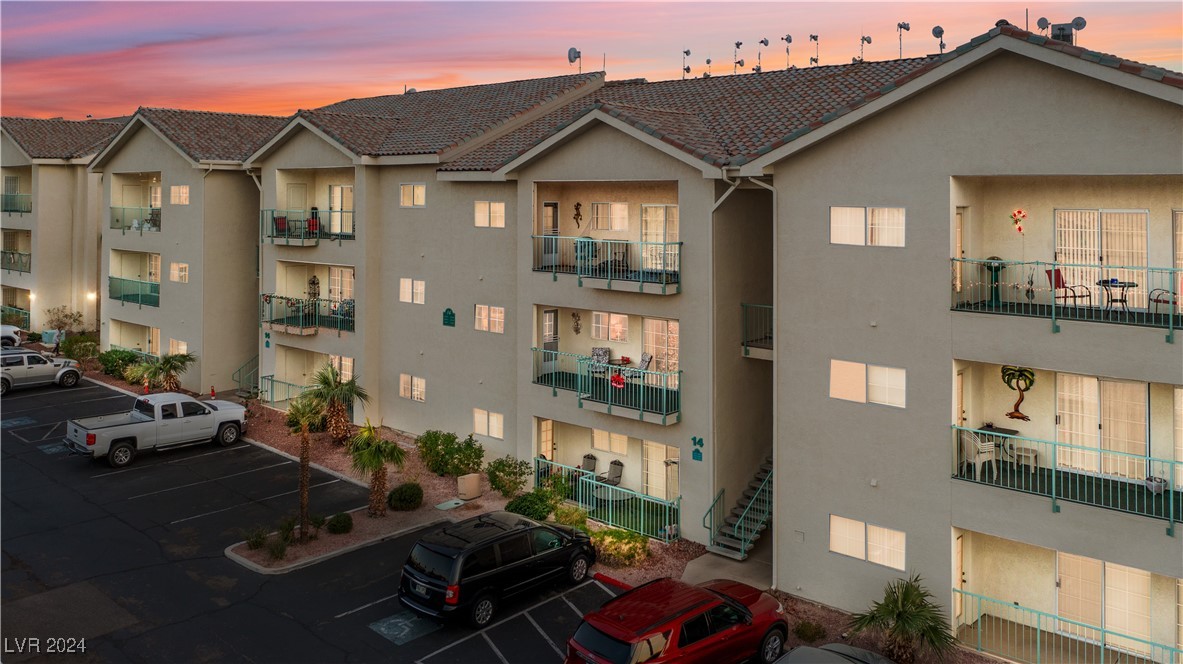 Dusk photo of the Home's building, the Unit is loc