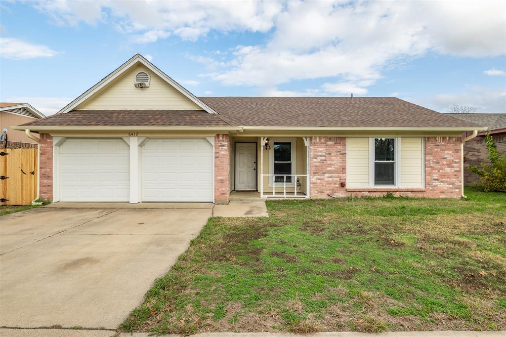 front view of house with a yard