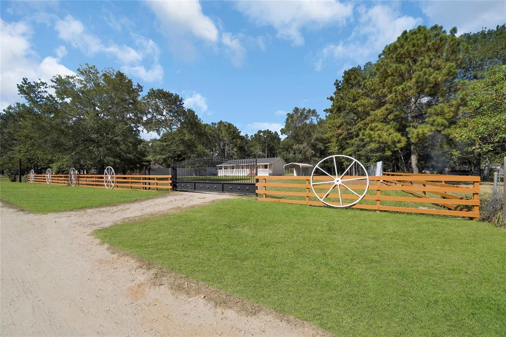 a view of a house with a big yard