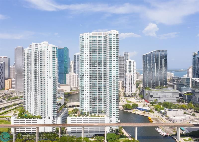 a view of a city with tall buildings