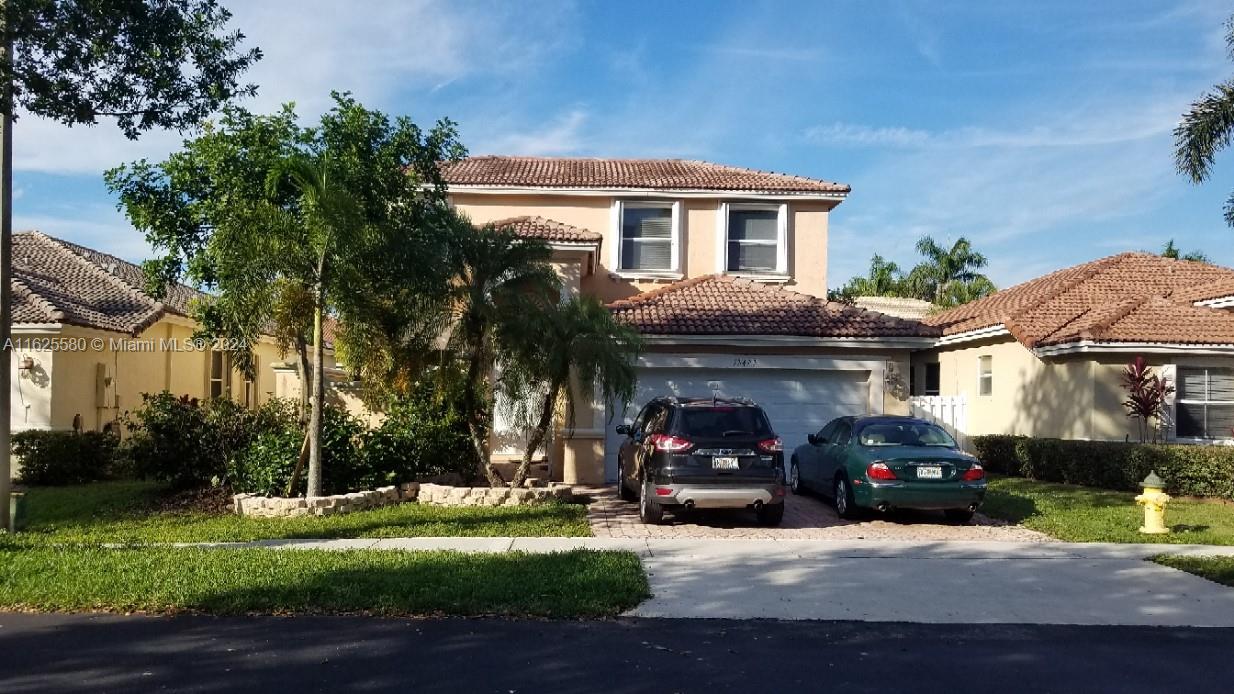 a car parked in front of a house