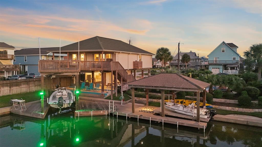 Sunset view of the decks and boat house.