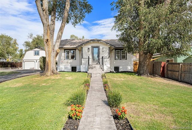 $1,250,000 | 6983 West 68th Avenue | Lamar Heights