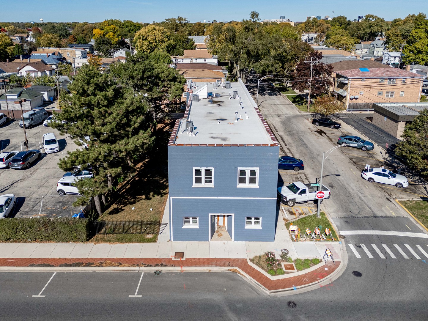 an aerial view of a house with a garden