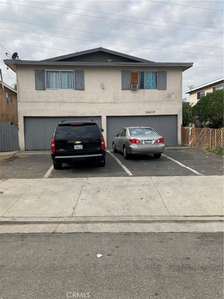 a car parked in front of a house