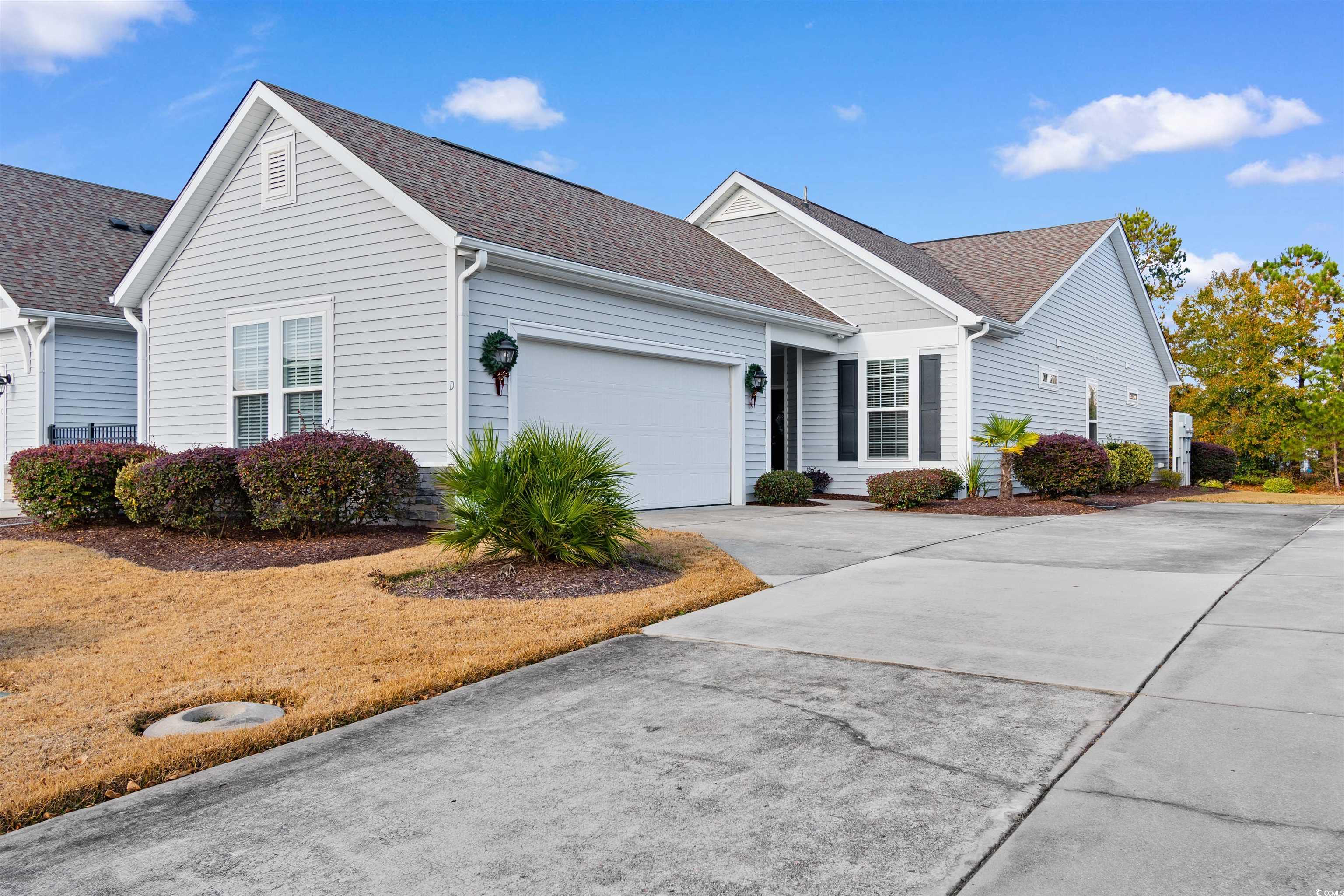 Single story home with a garage