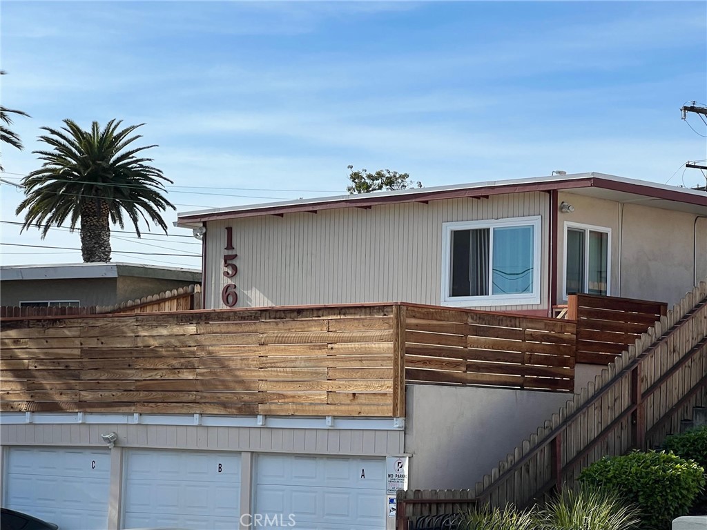 a view of a house with roof deck